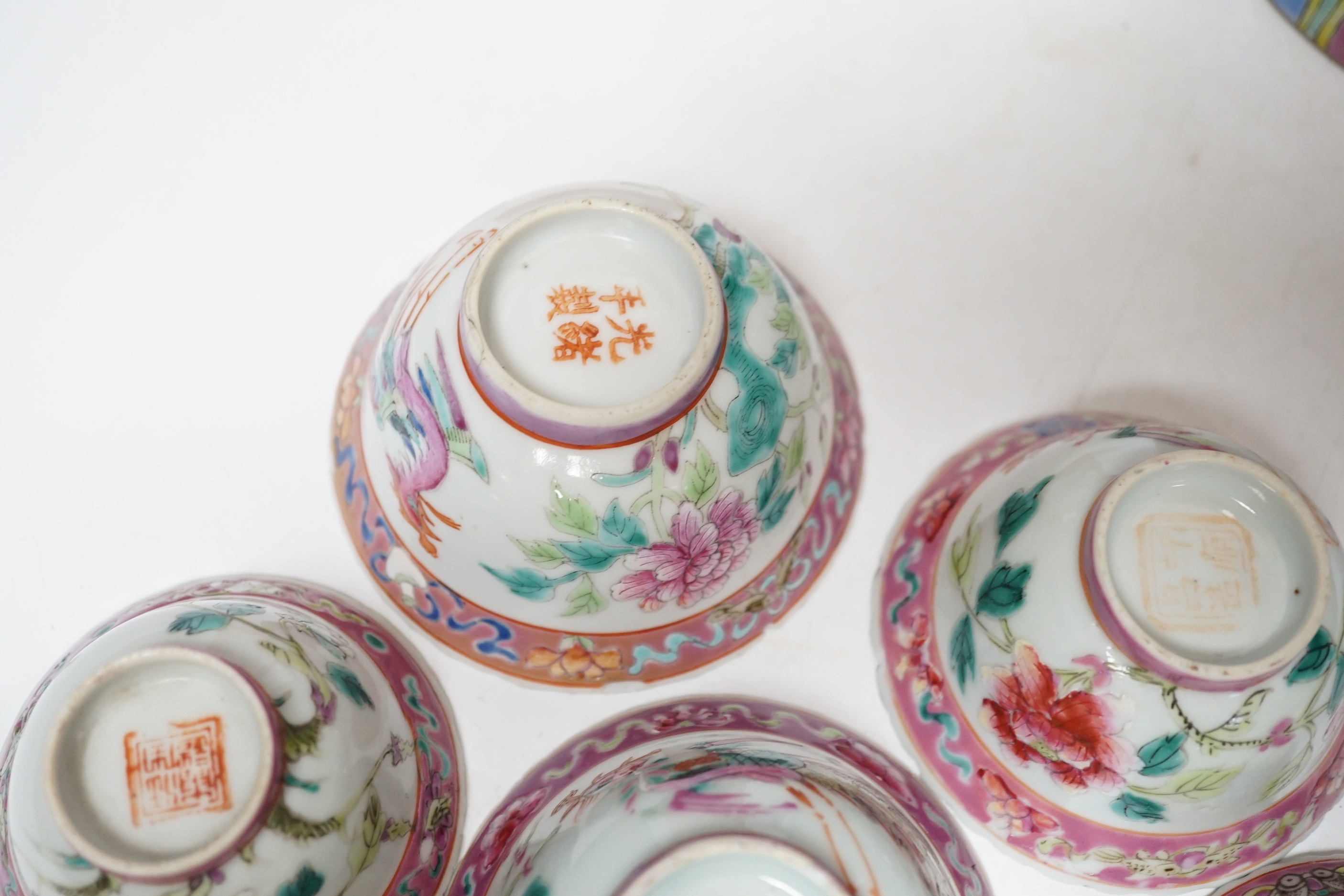 A Chinese Straits enamelled porcelain teapot and cover and seven similar tea bowls, Guangxu period and a pillow, teapot 18cm high including cover